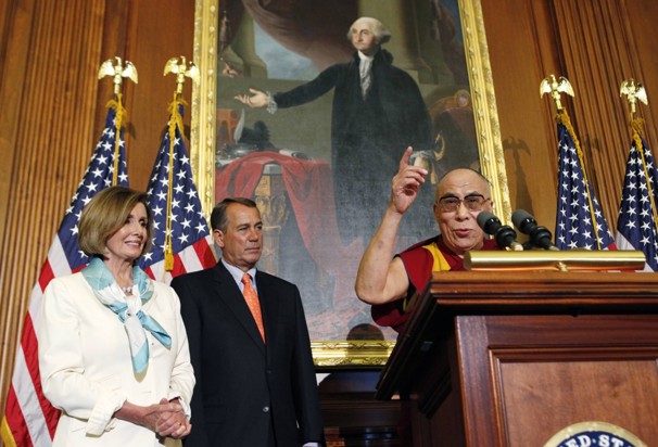 Nancy Pelosi, John Boehner, and the Dalai Lama being awarded the US Congressional Gold Medal in the US Capitol Rotunda.